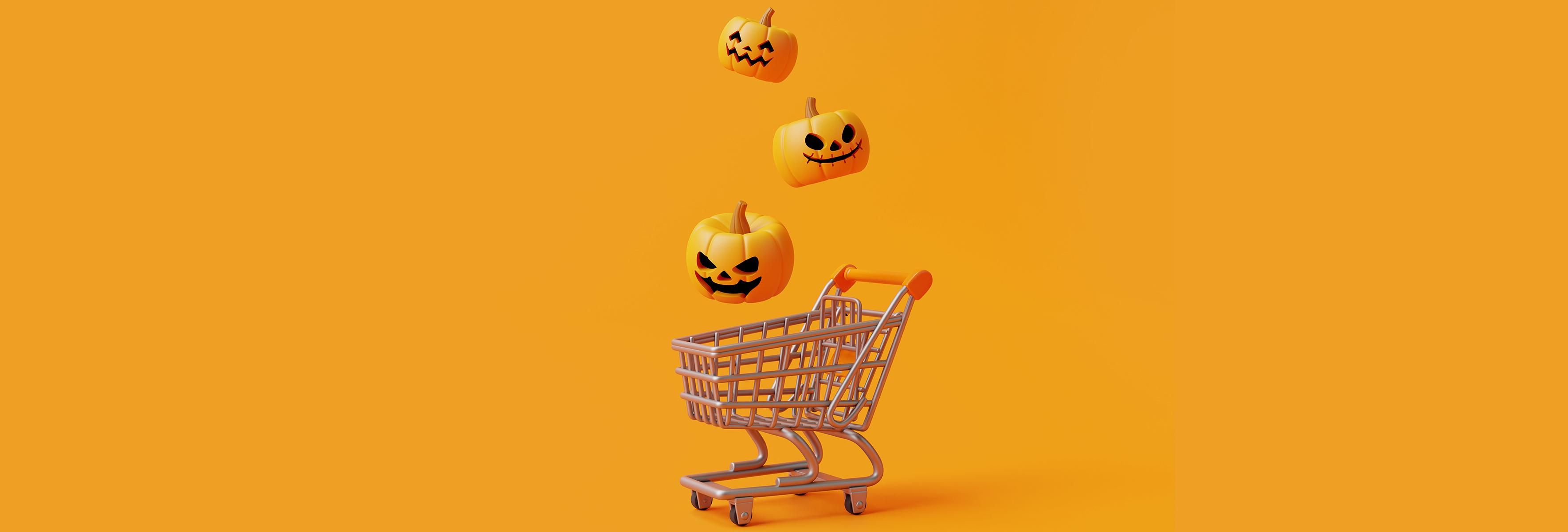 Shopping cart with scary looking pumpkins